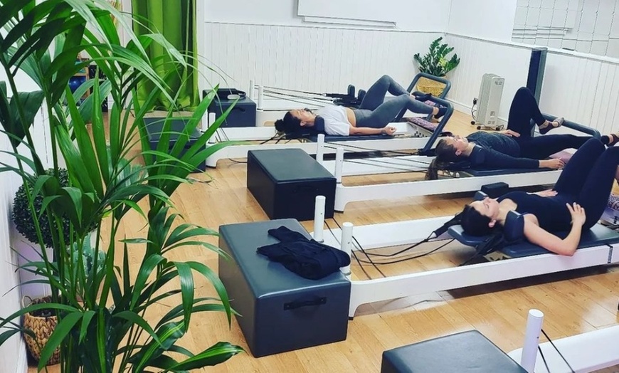 Image 3: Elevate Your Wellness Journey: 5, 10, or 20 Reformer Pilates Classes at Flowing Body Pilates (Up to 63% Off)