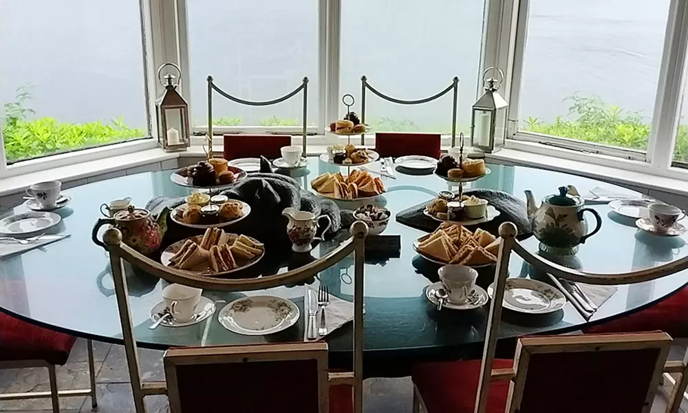 Delight in Prosecco Afternoon Tea for 2, 3, or 4 with Scenic Backdrop