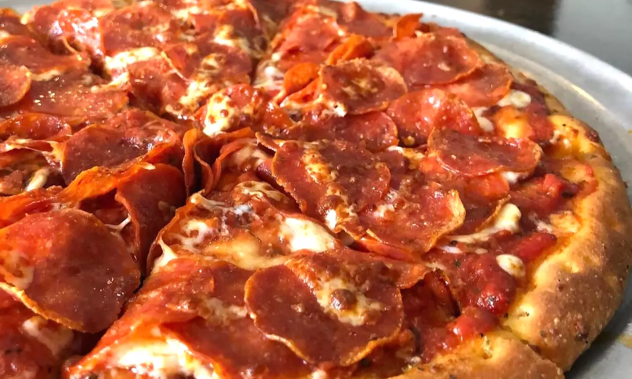 Enjoy Artisan Pizza, Specialty Sandwiches, Salads, Wings & Great Beers