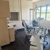 Image 1: One or Two Sessions of Dental Care Package: Exam, Cleaning, and X-Rays