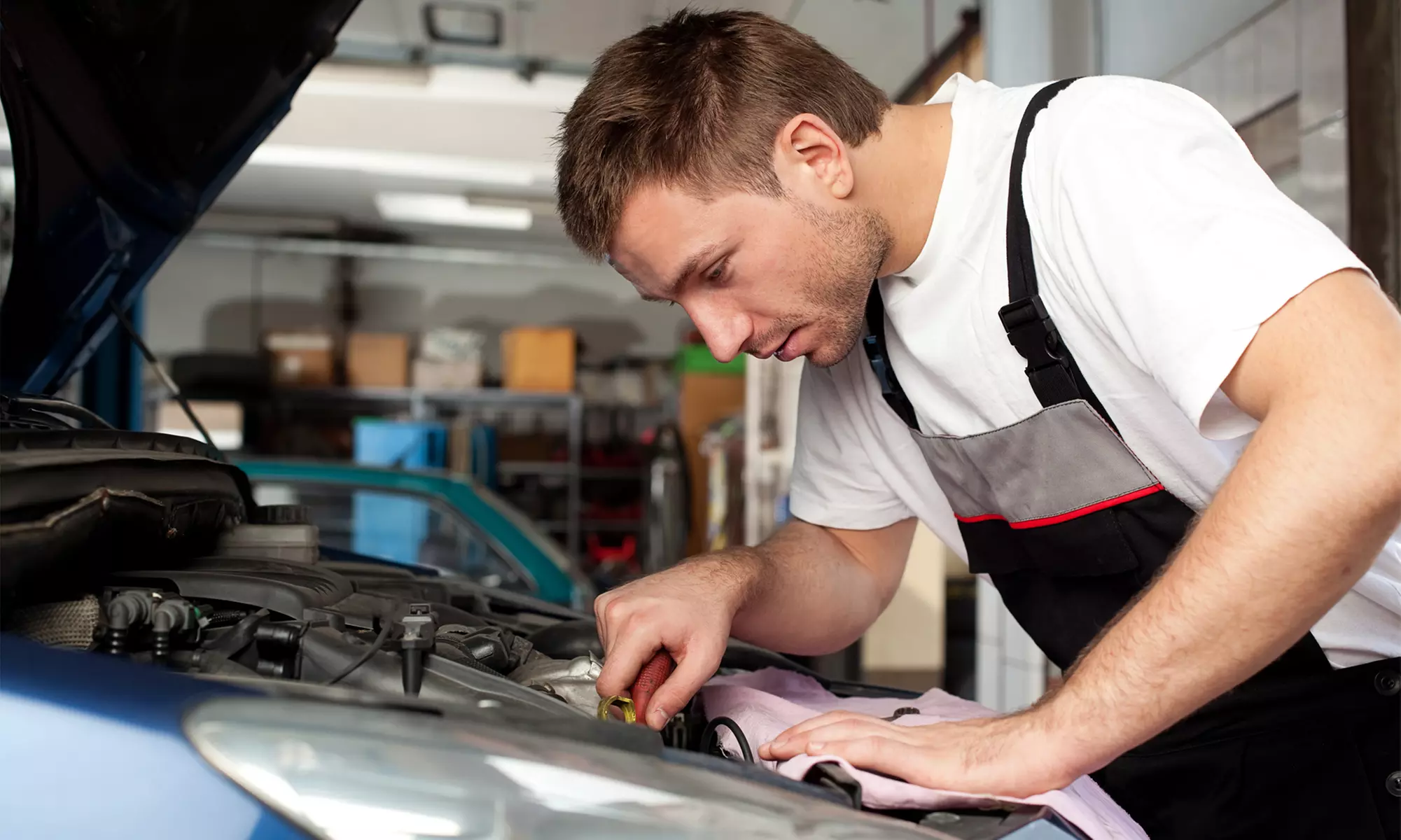 Stateside Auto Sales & Repair: Full or Semi-Synthetic Oil Change with 21-Point Maintenance Check (Up to 48% Off) - Primary Image
