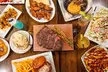 $25 or $50 to Spend on Food and Drink or Dinner for Two or Four with Drinks and Dessert ( Up to 41% Off ) - Second Medium