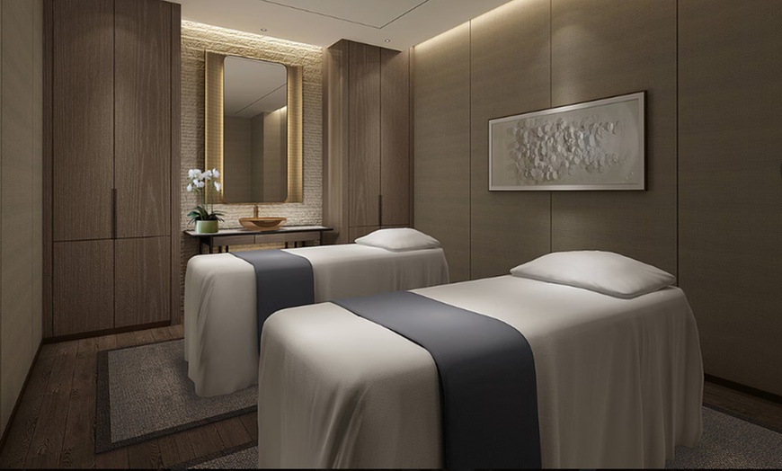 Image 1: Relax with a 60-Min Massage or Facial Combo Package with Mani or Pedi