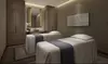 Experience Newlife Beauty Spa's Relaxing Massage or Facial Combos with Mani or Pedi, Up To 41% Off