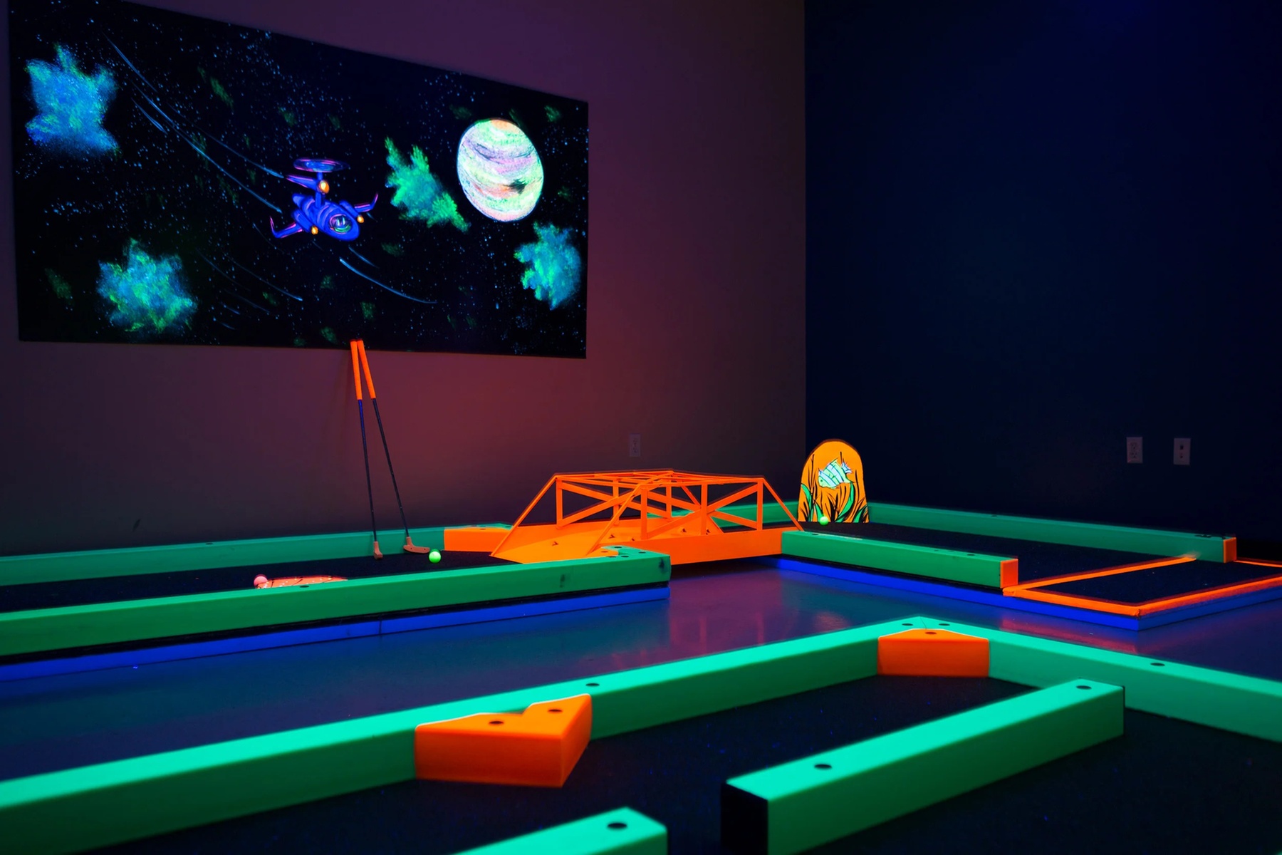 Glow-in-the-Dark Mini Golf Deals - Three Rounds for One to Six Players in NY