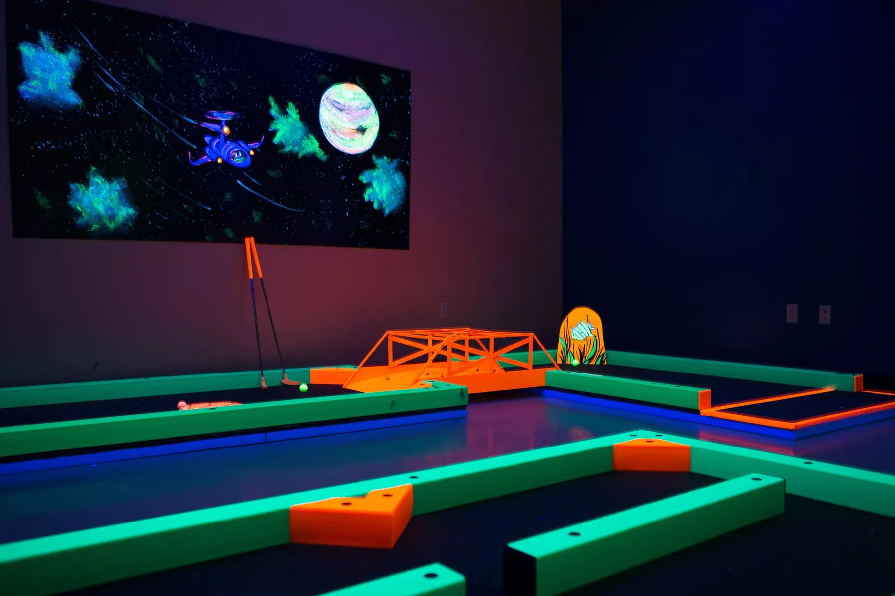 Glow-in-the-Dark Mini Golf Deals - Three Rounds for One to Six Players in NY