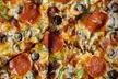 Up to $40 to Spend at Ada's Pizza (Up to 55% Off) on Exclusive deals - Second Medium