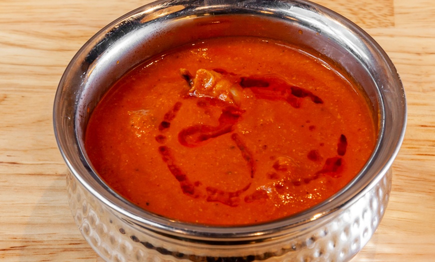 Image 8: Get $50–$150 Toward Food & Drinks at Me & Yogi Indian Kitchen
