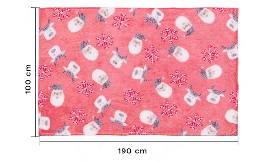 Image 3: Couverture plaid à motifs de Noël phosphorescents