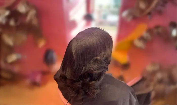 Achieve Silk Press Service for Smooth and Shiny Hair
