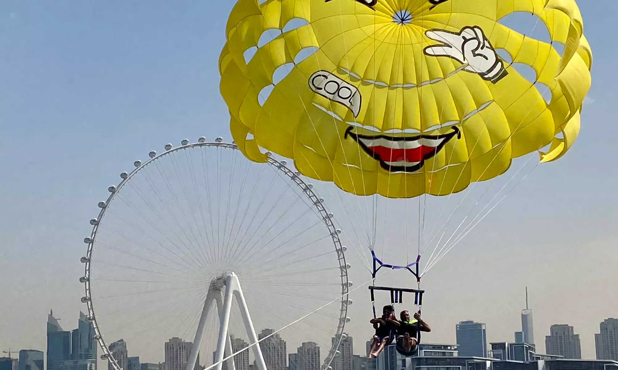 Soar Above Dubai's Coastline with 30-Minute Parasailing for One or Two