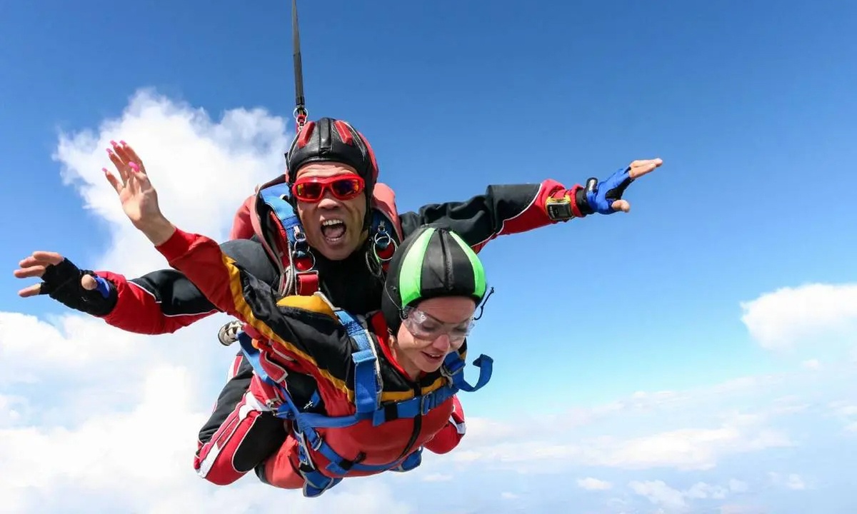 Leap Into The Sky: Tandem Skydiving Jump for One at Canton Air Sports 