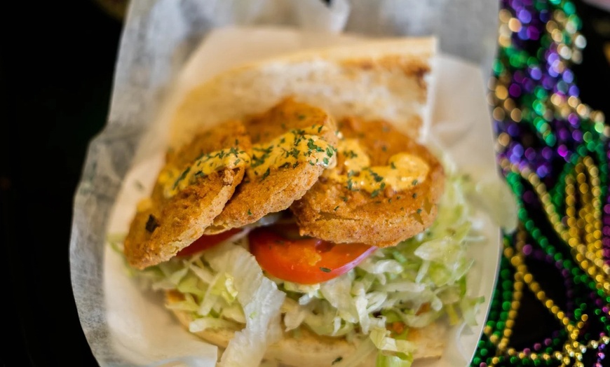 Image 6: Two Po'Boys, Meals for Two or Four With Beignets, and $50–$75 Credits