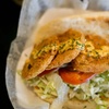 Image 6: Two Po'Boys, Meals for Two or Four With Beignets, and $50–$75 Credits
