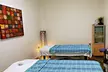 60-Minute Combo Massage including 30-Minute Back and 30-Minute Facial with Hot Stone Treatment (Up to 29% Off) - Second Medium