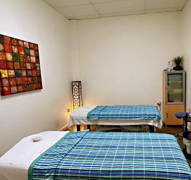 60-Minute Deluxe Massage with Hot Stones Treatment for One or Couples or 45-Minute Combo Massage (Up to 30% Off)