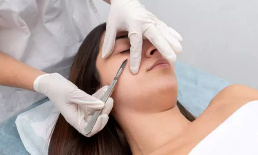 Image 1: Get a Quick Glow with Express Dermaplaning: One, Two or Three Sessions