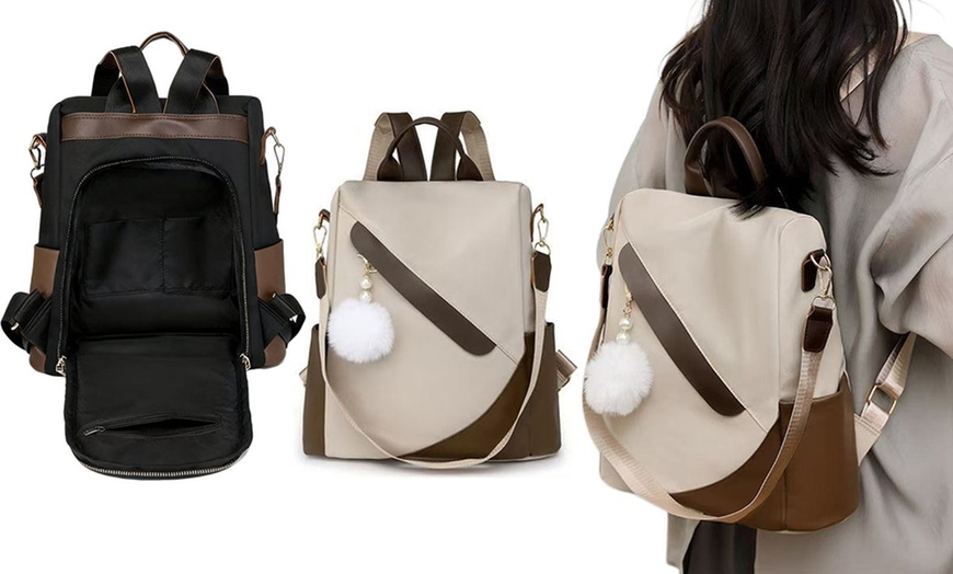 Image 1: Anti-Theft Backpack, Water-Resistant with Removable Pom Pom Charm