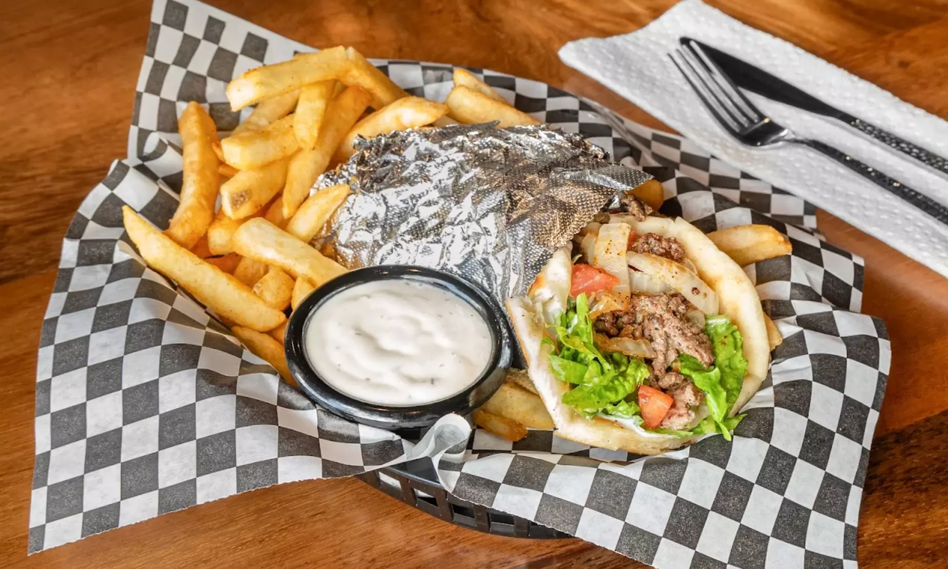 $50, $75, or $100 Dining Credit | Dozen Wings, Fries, Entrees, & More