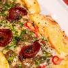 Image 3: Savor Authentic Turkish Pide with a Refreshing Drink