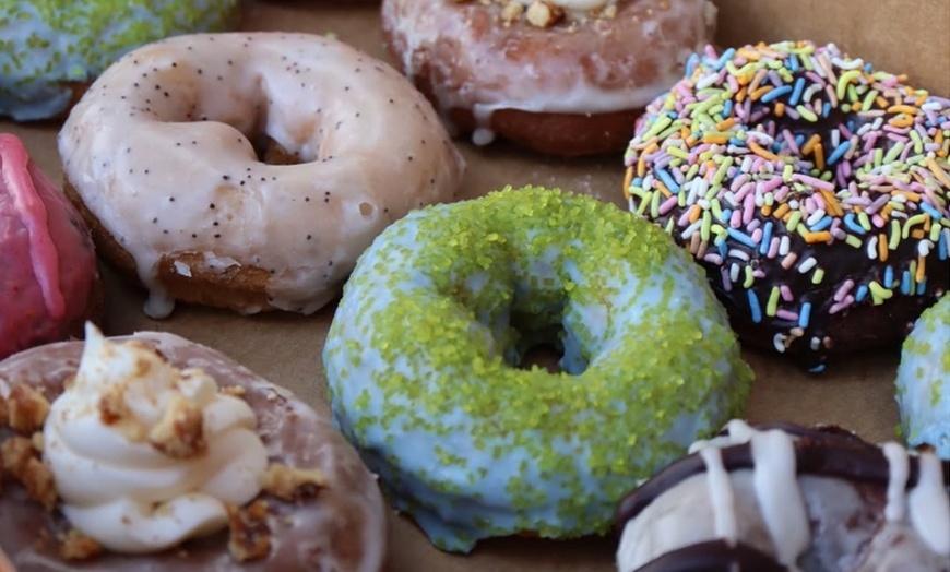Image 18: Up to a Dozen Donuts, 4 Donuts & 2 Drinks or $50 to Spend