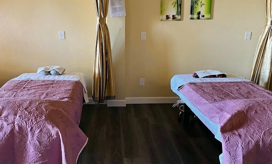 Image 3: Relax with 60, 90, or 120 Min Massage with Hot Stone and Coconut Oil