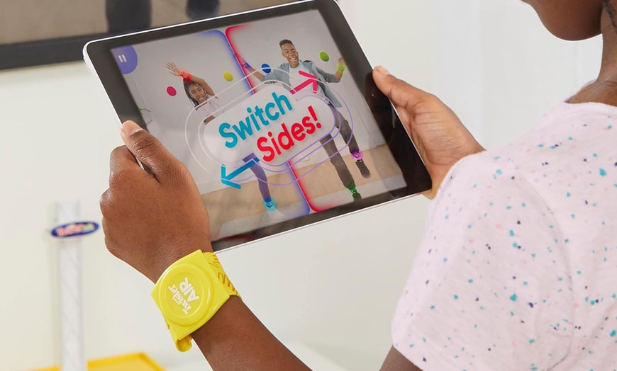 Image 3: Hasbro Twister Air Party Game Includes 4 Twister Air Wrist Bands