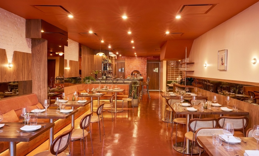 Image 2: A Warm Culinary Journey: Redefining Italian Classics with Global Flair