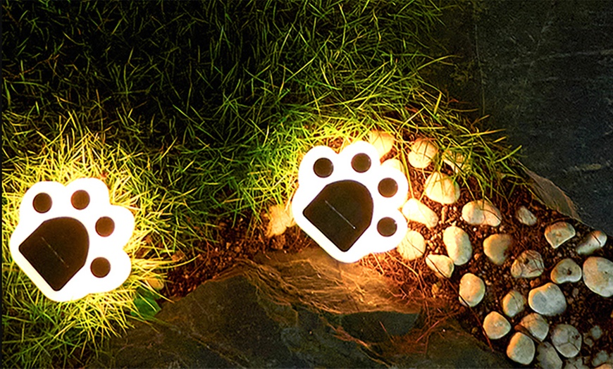 Image 4: Four Piece Solar LED Light Bear Paw Garden Lamp