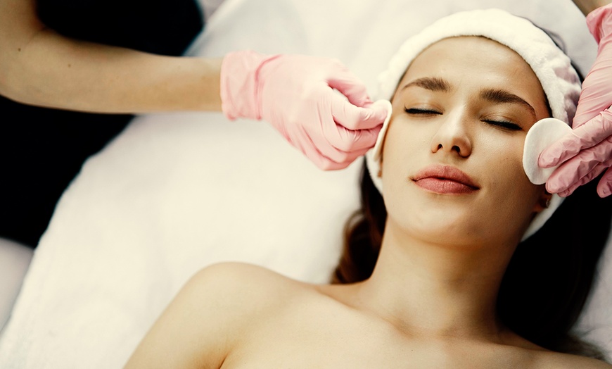 Image 1: Glow with One or Two Carbon Laser Peel or 45-Min Advanced Facial 