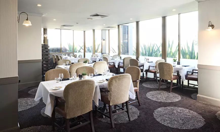 Image 1: 2-Course Dinner with Wine or Beer at View Brisbane for Up to 4 People