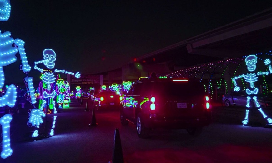 Image 5: Enchanted Lights: A Mile-Long Halloween Themed Drive-Thru Light Show
