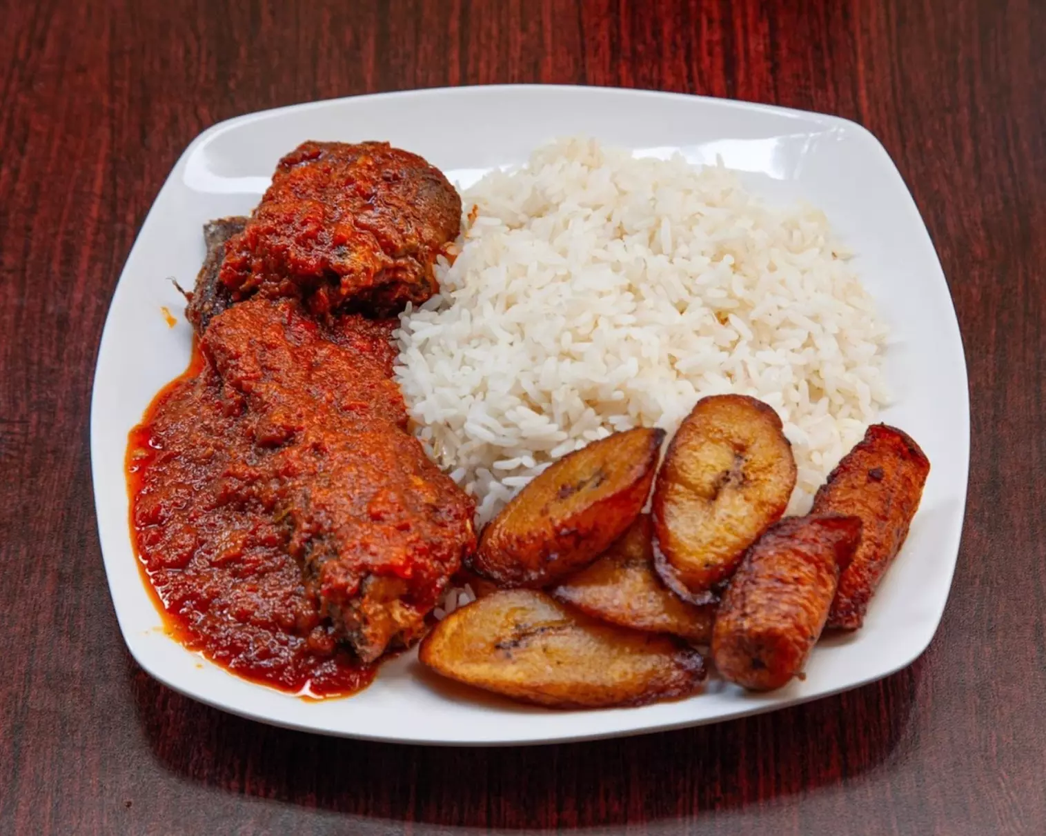 Jollof Rice Combo or $40 Toward Nigerian Cuisine for Two or More