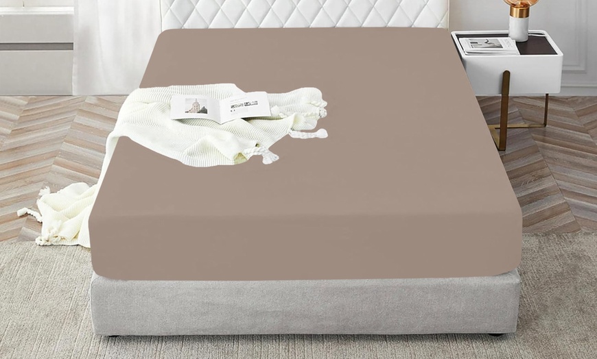 Image 17: Sábana bajera con esquinas