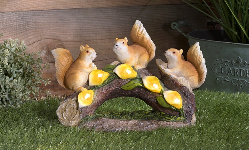 Image 8: One or Two Solar-Powered LED Illuminated Squirrels on Log Decorations