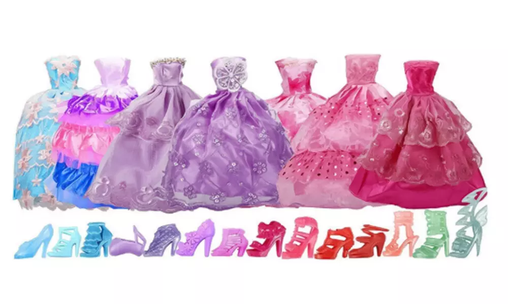 Set di 35 pezzi di vestiti e accessori per bambole