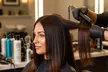 Haircut with Silk Press Styling, Blow Dry,  All Over Color, & More at Alexandra Nicole Creations (Up to 57% Off) - Second Medium