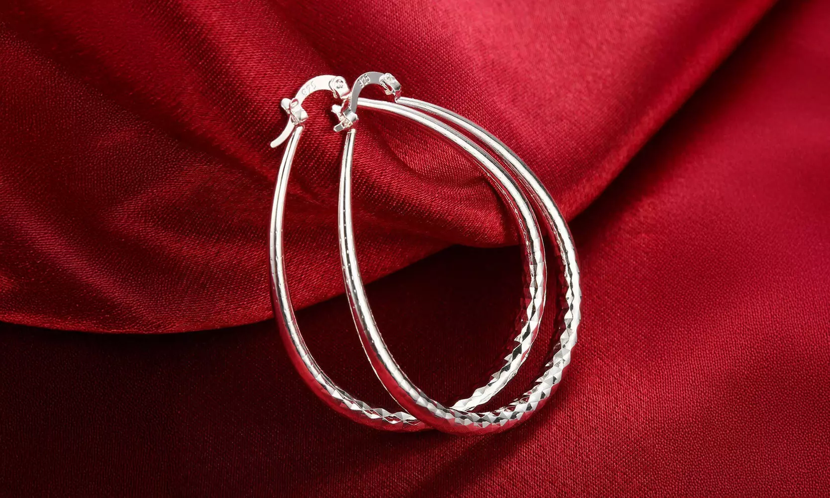 925 Sterling Silver Diamond-Cut Oval Hoop Earrings
