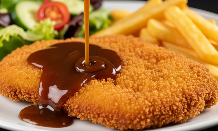 Image 2: Schnitzel Schnitzel Dinner and Show One, Two, Four, or Eight People