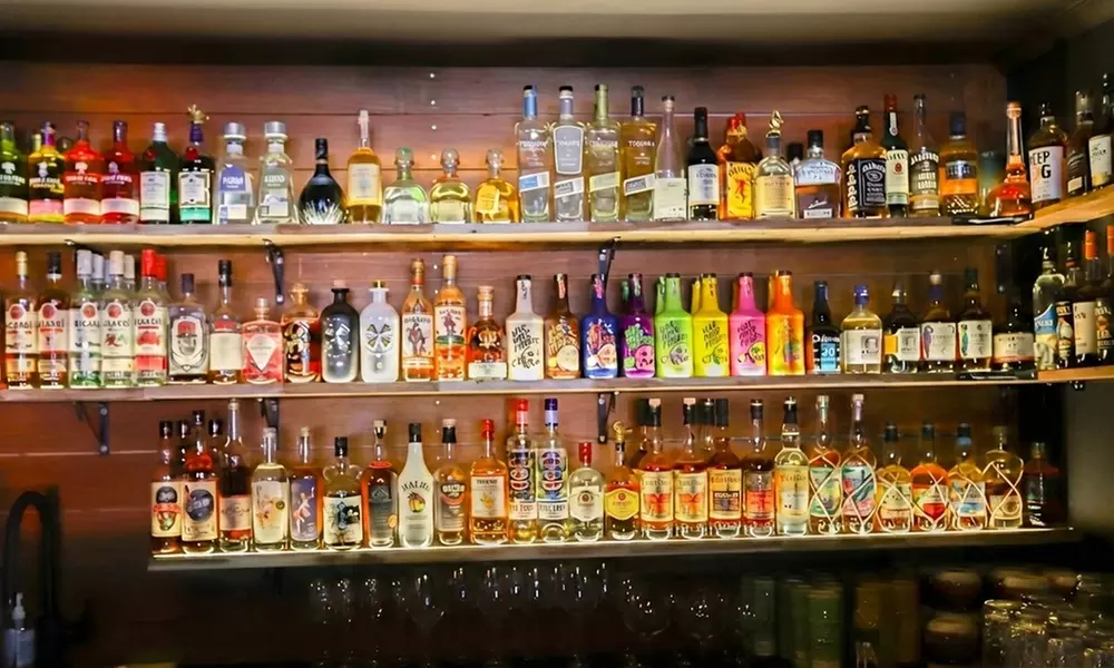 Kickstart Your Night with a Flight of Shots, Wine or 3 House Cocktails