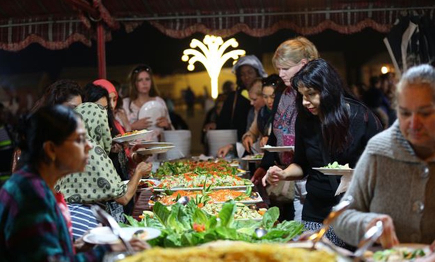 Image 1: New Year Party in the Desert with Optional Bus Pickup for 1, 2, or 4 