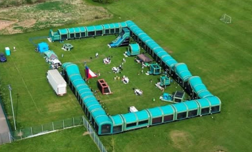 Image 2: Bounce Camp: Family Tickets for 640ft Inflatable Obstacle Course Fun