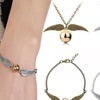 Image 1: Snitch Inspired Necklace and Bracelet Set