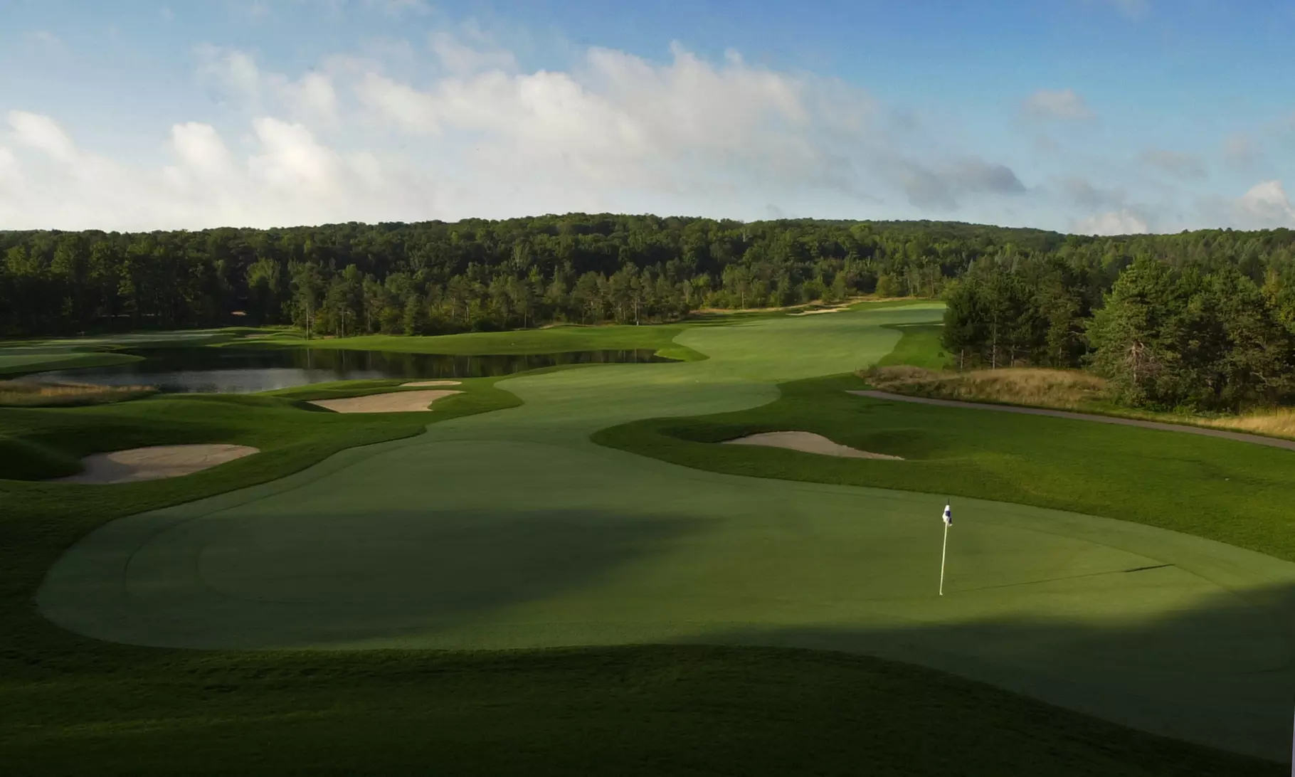 1- or 2-Night Stay for Up to Eight with Optional Golf at the 4-Star Hawk's Eye Golf Resort in Bellaire, MI - Primary Image