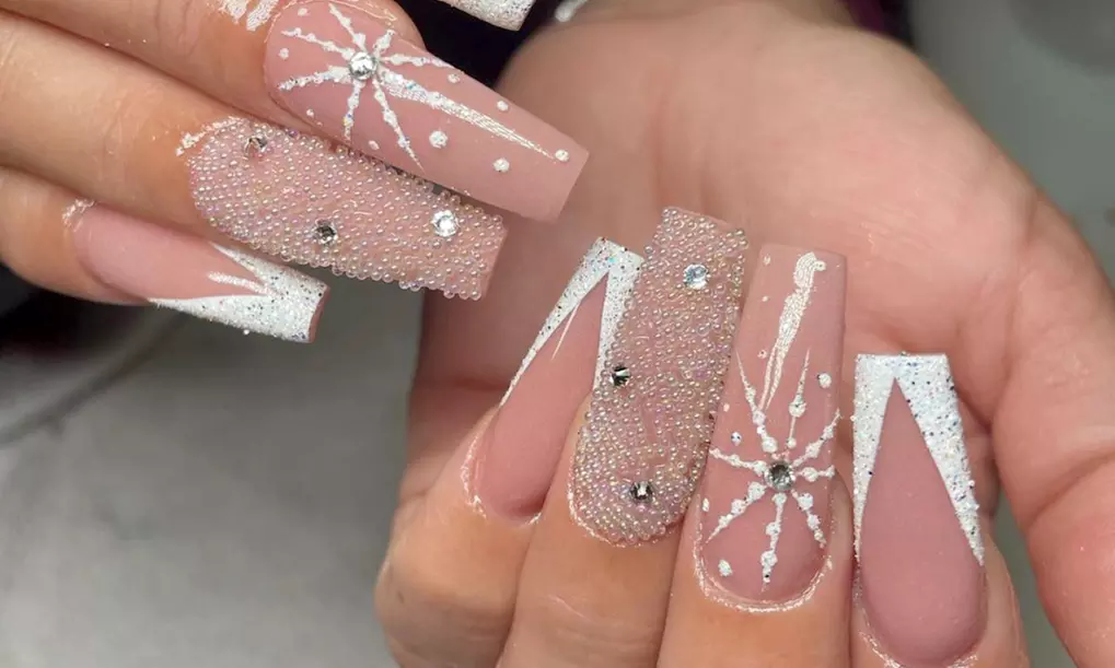 Pamper Your Nails with Deluxe/Gel-X Manicure, and Luxury Pedicure at New Looks Salon Nail & Hair (Up To 50% Off)