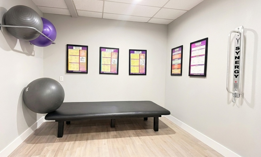 Image 3: Chiropractic Exam, Adjustment, and Therapy Sessions