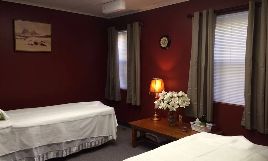 Image 1: Renew & Glow: Hot-Stone Massage with Aromatherapy & Body Scrub