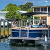 Image 1: Luxury Tritoon Boat Rentals and Group Excursions