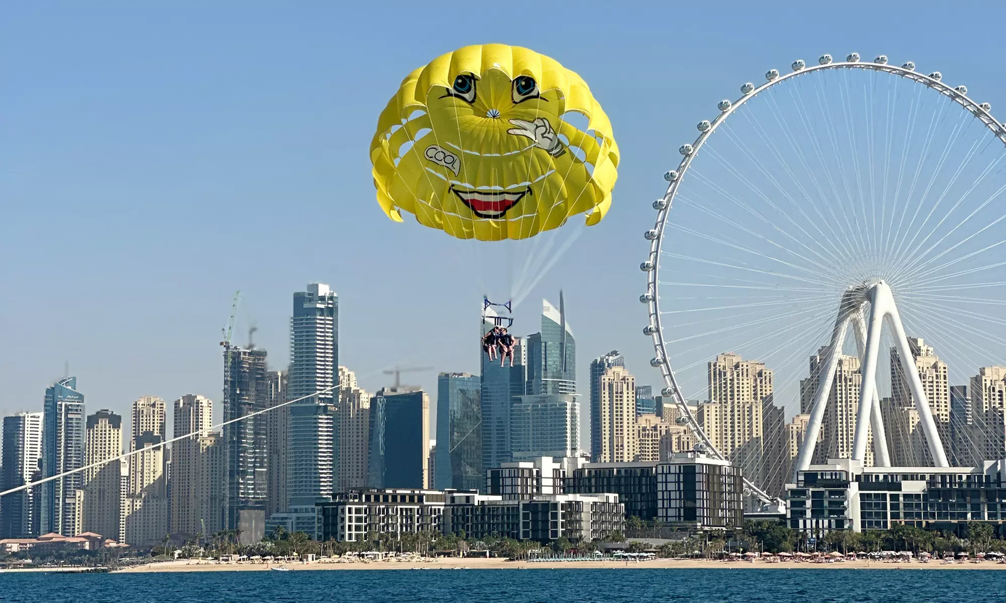 Soar Above Dubai's Coastline with 30-Minute Parasailing for One or Two