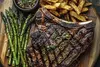 Kick back, breathe in the good vibes $50, 75, $100 or $150 to Spend on Food & Drinks at Kazuza (Up On 53% Off)